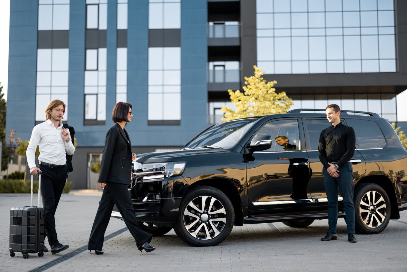 Corporate Executive entering Luxury Taxi